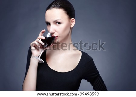woman with wine glass in hand