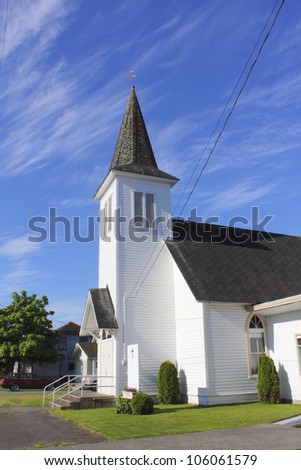 An old, historic, Christian church has been well maintained by its congregation/One Hundred Year Old Christian Church/A well cared for church in rural Canada