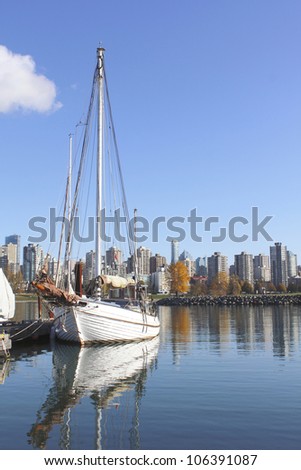 A boat is moored in English Bay near Vancouver\'s West End/A Marina on English Bay/A boat is docked in Vancouver\'s English Bay