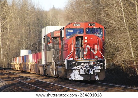 MISSION, BC/CANADA - DECEMBER 1: A CN employee enters a train engine to start his shirt work on December 1, 2014.
