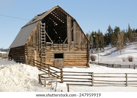 View of an old, rundown barn in winter/Old, Rundown barn in winter/View of an old, rundown barn in winter
