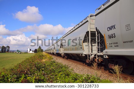 MISSION,BC/CANADA: JULY 25, 2015: A train loaded with potash heads for the west coast of Canada on July 25, 2015.