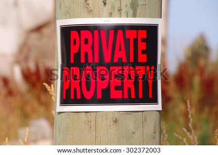 A sign clearly states that the property is private/Private Property /A sign clearly states that the property is private.