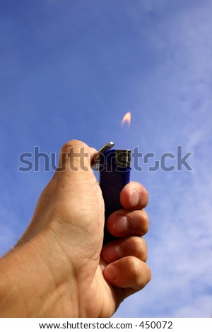 holding up lighter with flame