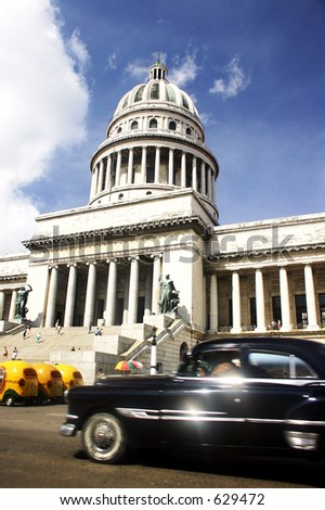 stock photo Old car in front of Capitolio landmak in Habana Cuba