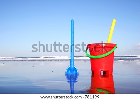 Bucket and spade on the beach