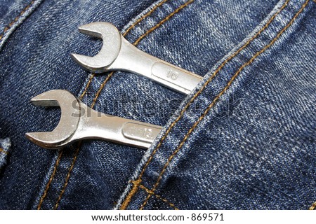 Spanners in denim jeans pocket