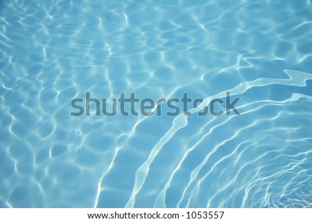 Swimming pool water with circular waves