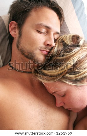 Man and woman in bed