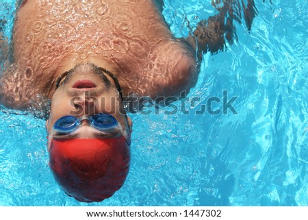 Man in swimming kit in pool