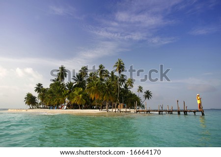 Woman on a tropical island jetty