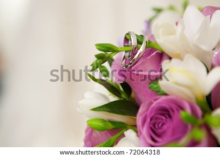 stock photo bouquet of flowers and wedding dress as background
