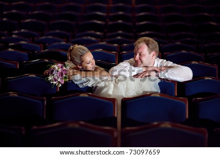 bride and groom at the theater