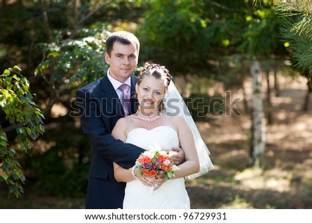 portrait of the bride and groom outdoors