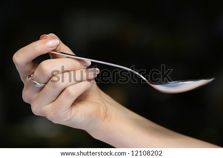 Hand with spoon