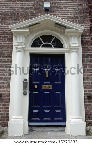 Dark blue front door in urban street