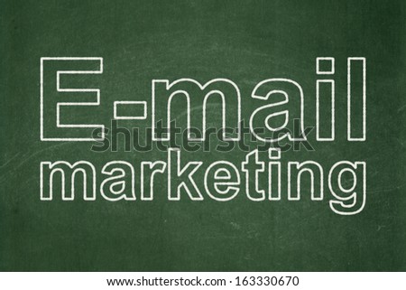 Advertising concept: text E-mail Marketing on Green chalkboard background, 3d render