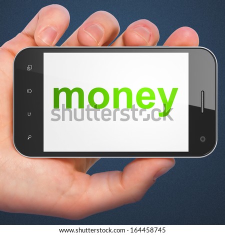 Finance concept: hand holding smartphone with word Money on display. Mobile smart phone on Blue background, 3d render