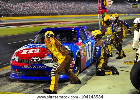 CHARLOTTE, NC - MAY 27:   Kyle Busch tire change at the Nascar Coca Cola 600  at Charlotte Motorspeedway in Charlotte, NC on May 27, 2012