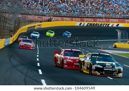 CHARLOTTE, NC - MAY 27: Ryan Newman leads Kurt Busch  at the Nascar Coca Cola 600  at Charlotte Motorspeedway in Charlotte, NC on May 27, 2012