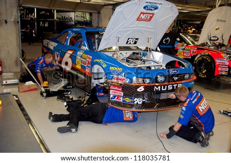 DALLAS, TX - NOVEMBER 02: Garage crew working late on Ricky Stenhouse Jr\'s car after the Nascar Nationwidet Cup Practice at Texas Motorspeedway in Dallas, TX on November 02, 2012