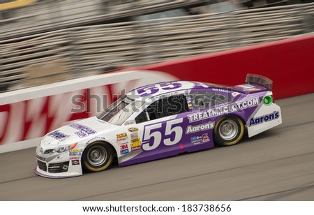 FONTANA, CA - MAR 22: Brian Vickers at the Nascar Sprint Cup practice at Auto Club Speedway in Fontana, CA on March 22, 2014