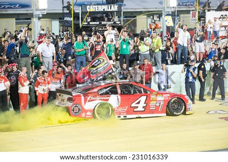 MIAMI, FL - Nov 16: Kevin Harvick wins the Nascar Sprint Cup Ford Ecoboost 400 race at Homestead-Miami Raceway in Homestead, FL on November 16, 2014