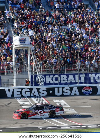 LAS VEGAS, NV - March 07: White flag for Austin Dillon at the NASCAR Boyd Gaming 300 Xfinity race at Las Vegas Motor Speedway in Las Vegas, NV on March 07, 2015