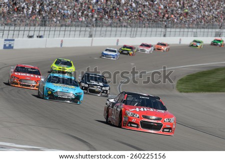 LAS VEGAS, NV - March 08: Regan Smith (41) leading a pack of cars at the NASCAR Sprint Kobalt 400 race at Las Vegas Motor Speedway on March 08, 2015
