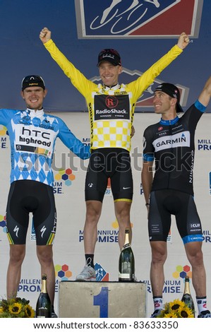DENVER, CO - AUG 28: Winner Levi Leipheimer with Tejay Van Garderen (left)  and Christian Vandevelde (right) on the podium of the 2011 USA Pro Cycling Challenge in Denver, Colorado on Aug 28, 2011
