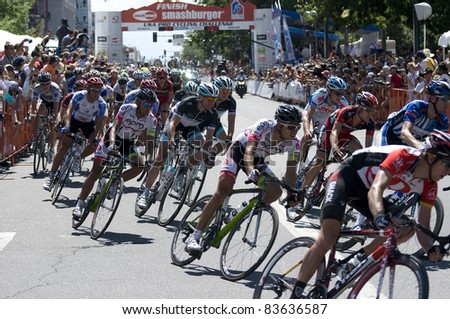 DENVER, CO - AUG 28: Professional cyclists maneuvering through a tight turn at the 2011 USA Pro Cycling Challenge in Denver, Colorado on Aug 28, 2011
