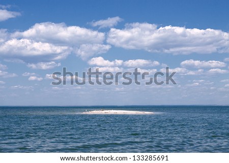 The cobalt blue sea and blue sky. Summer landscape with sea and blue sky