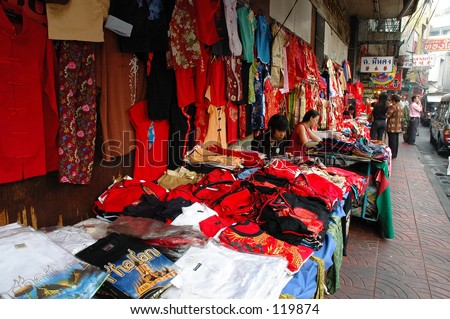 Vendors selling clothes for the Chinese Lunar New Year in Bangkok Chinatown