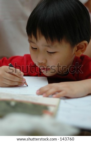 5-year old Chinese boy, learning to write