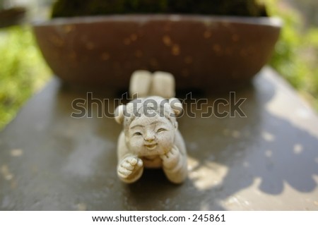Statue of little Chinese girl in ancient costume