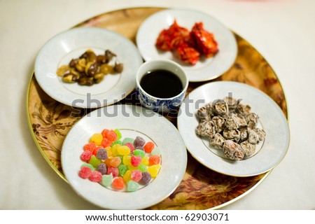 Food items used as part of the obstacles that a bridegroom has to overcome in order to win his bride. This is Chinese wedding culture in Malaysia.