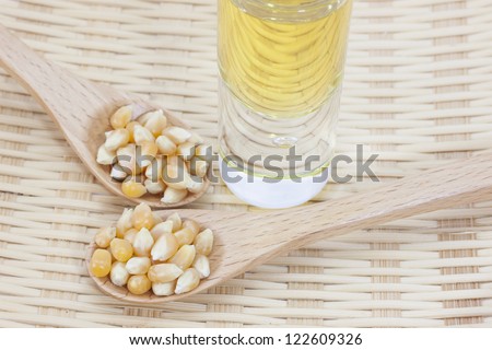 Corn seed with corn oil on a bamboo basket