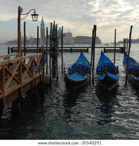 Venice, Italy: Moored gondolas in St.Mark basin during a winter sunset