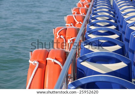 Life belts and chairs back on a touristic boat