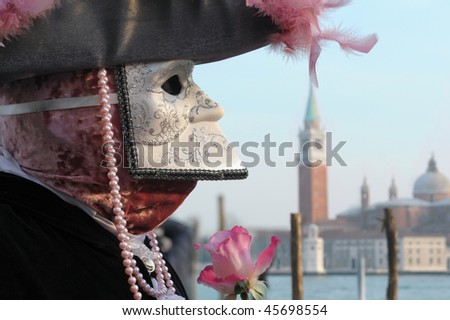 Venice carnival: Mask posing along St.Mark promenade