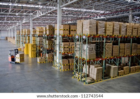 Forklift loader worker driver at warehouse