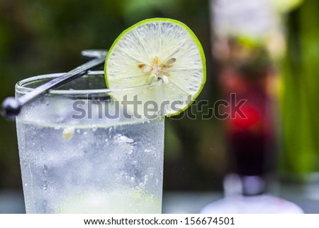 refreshing gin tonic on the wooden table