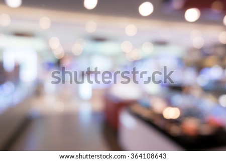 Abstract people shopping in department store. blurry for background.