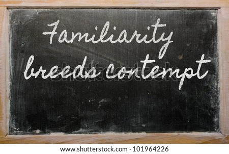 Handwriting Blackboard Writings - Familiarity Breeds Contempt Stock ...