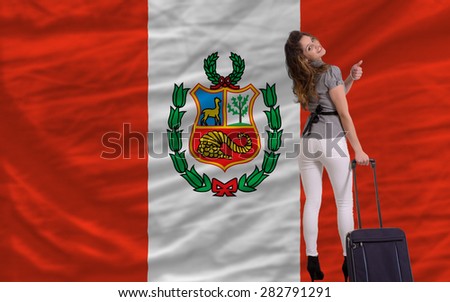 young beautiful woman is traveling to peru