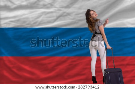 young beautiful woman is traveling to russia