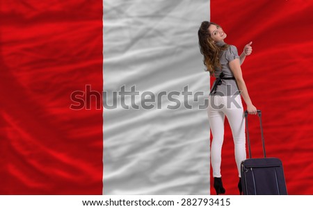 young beautiful woman is traveling to peru