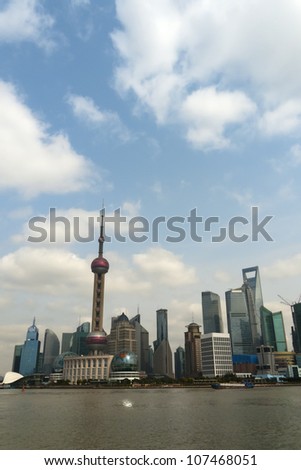Shanghai Pudong as seen from the Bund. Day vertical view from march 2012.