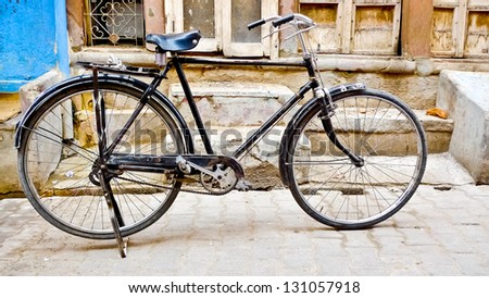 Old classic bike in the streets of Bikaner, Rajasthan, India