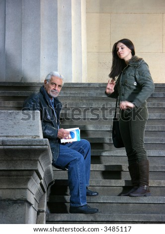 Omar Sharif and young actress during shooting in Wall Street, New York